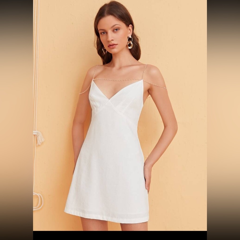 White dress with sparkly strap detail. Size L, NWOT never worn